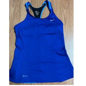 Blue Nike Dri-Fit sport tank. Women’s medium w/ built in bra.